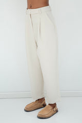 Gaiia Pleated Carrot Trousers