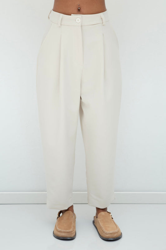 Gaiia Pleated Carrot Trousers