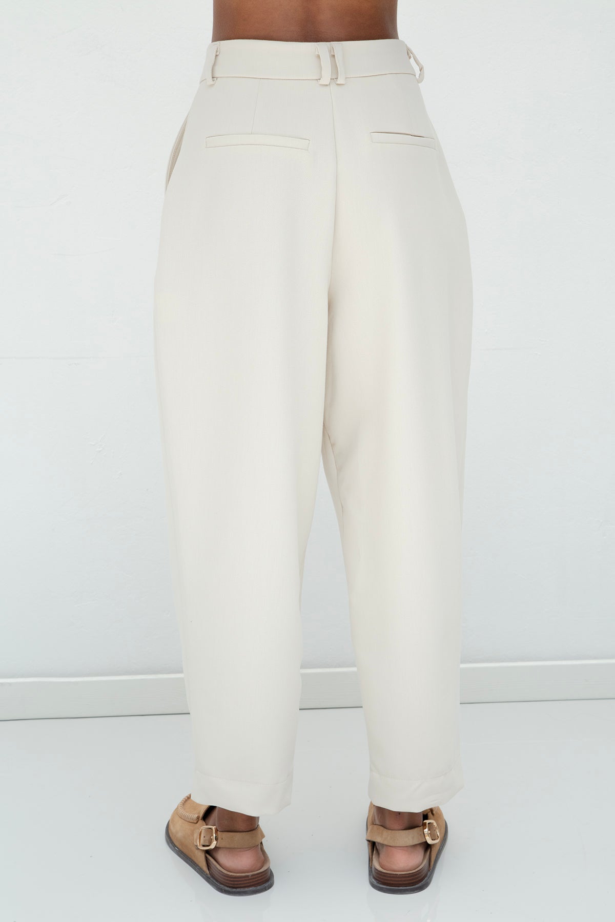 Gaiia Pleated Carrot Trousers